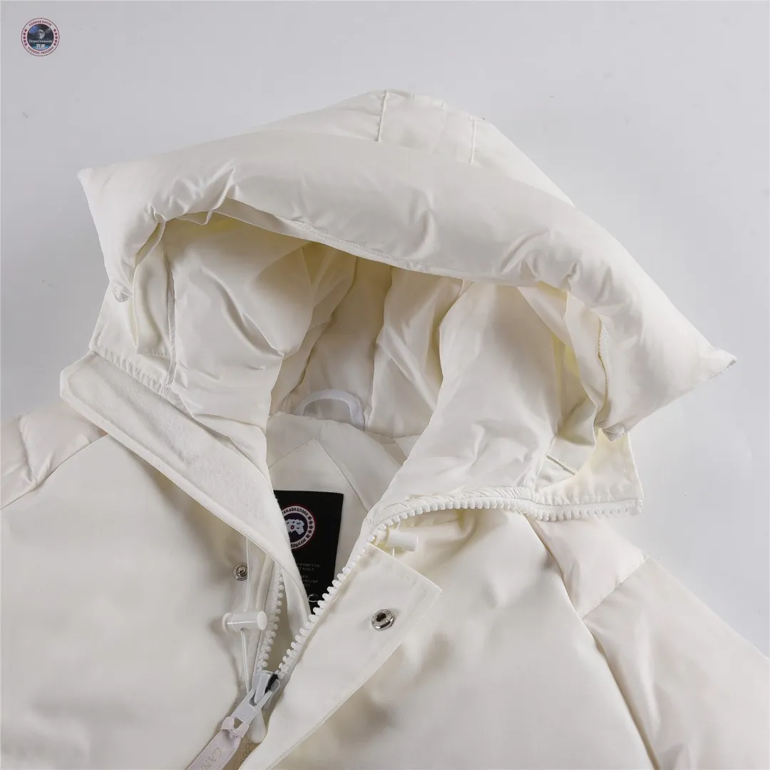 P840 🌟New model on sale! Canada Goose Paradigm Collection New Style 01 · Two-way front zipper with placket for extra coverage · Lightweight quilted down sleeves · Woven grab strap at upper back with "Canada Goose" logo patch · Sustainable Arctic Tech® elbow patches for durability · Rib knit hem and cuffs lock in heat · Suede tricot chin guard provides a soft touch Five external pockets: two handwarmer pockets, two lower pockets with flap closure, one utility pocket on the sleeve Three internal pockets: two drop-in pockets, one zippered pocket Internal straps allow the jacket to be worn over the shoulder, hands-free Color: Black White Sizes: XXS XS S M L XL XXL